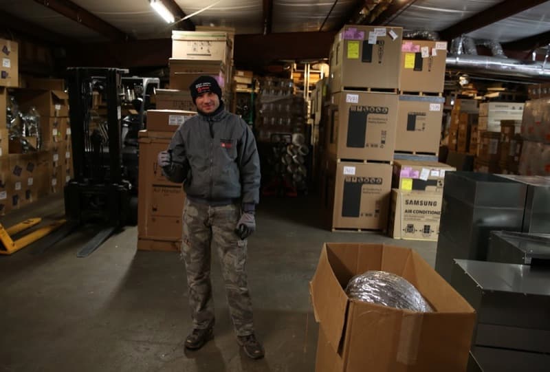 Quality Comfort team member in the warehouse